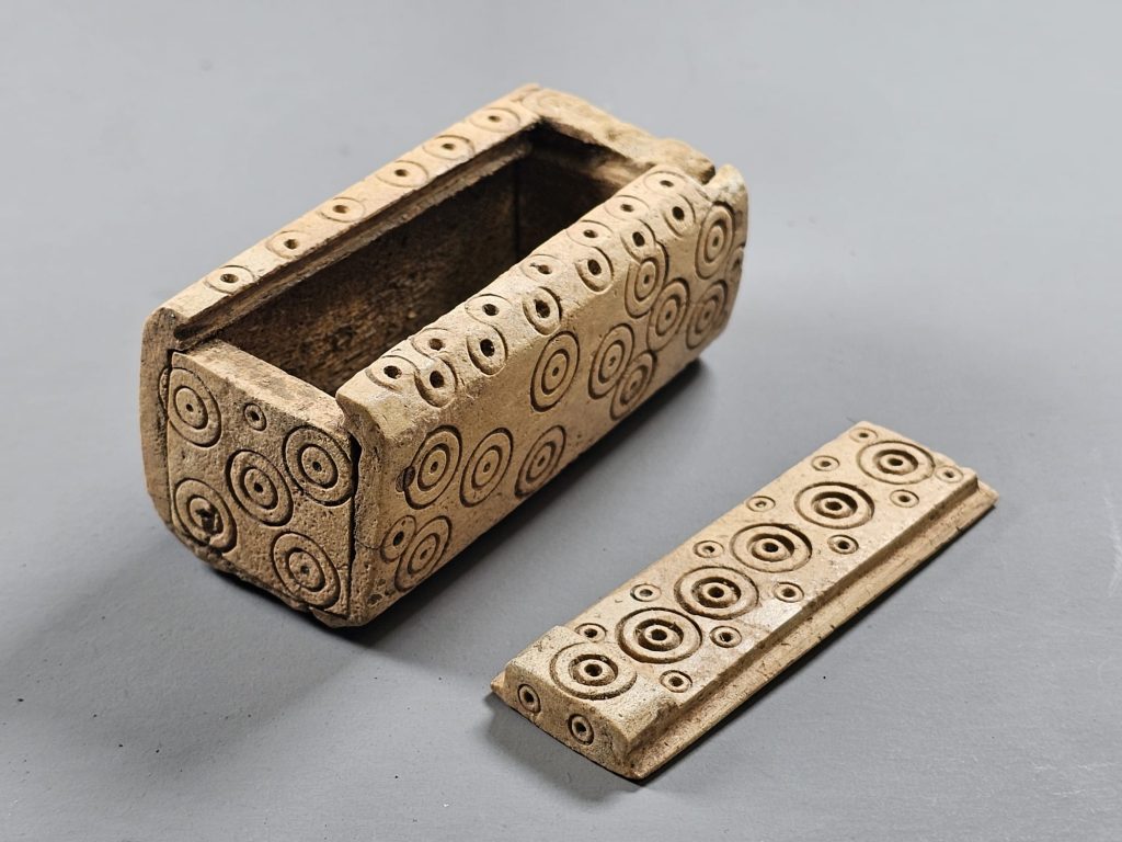 Carved bone box with sliding lid removed. Credit: Wychavon District Council