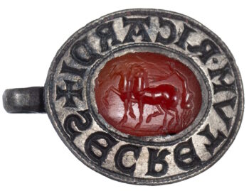 Image Credit: Seal - This rare medieval seal with a Roman gemstone was found in Essex. Colchester and Ipswich Museum Services