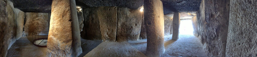 A panoramic view inside the Menga dolmen, revealing its massive stone chamber. Credit: Wikipedia Commons