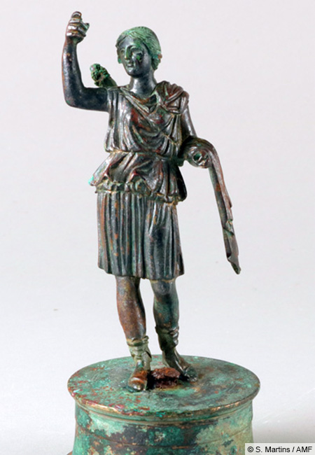 On the bottom of a well in the cult district of Nida, which was filled after 249 CE, this high-quality bronze statuette of the goddess Diana was discovered among other finds. The Roman goddess of the hunt likely once held a bow and a spear in her hands. Credit: S. Martins / Archaeological Museum Frankfurt