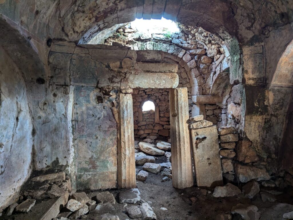 Interior of Agios Georgios Church, where classical, Roman, and Byzantine architectural traditions merge. The site symbolically reflects the layered genetic heritage preserved among Deep Mani inhabitants. Credit: Leonidas-Romanos Davranoglou