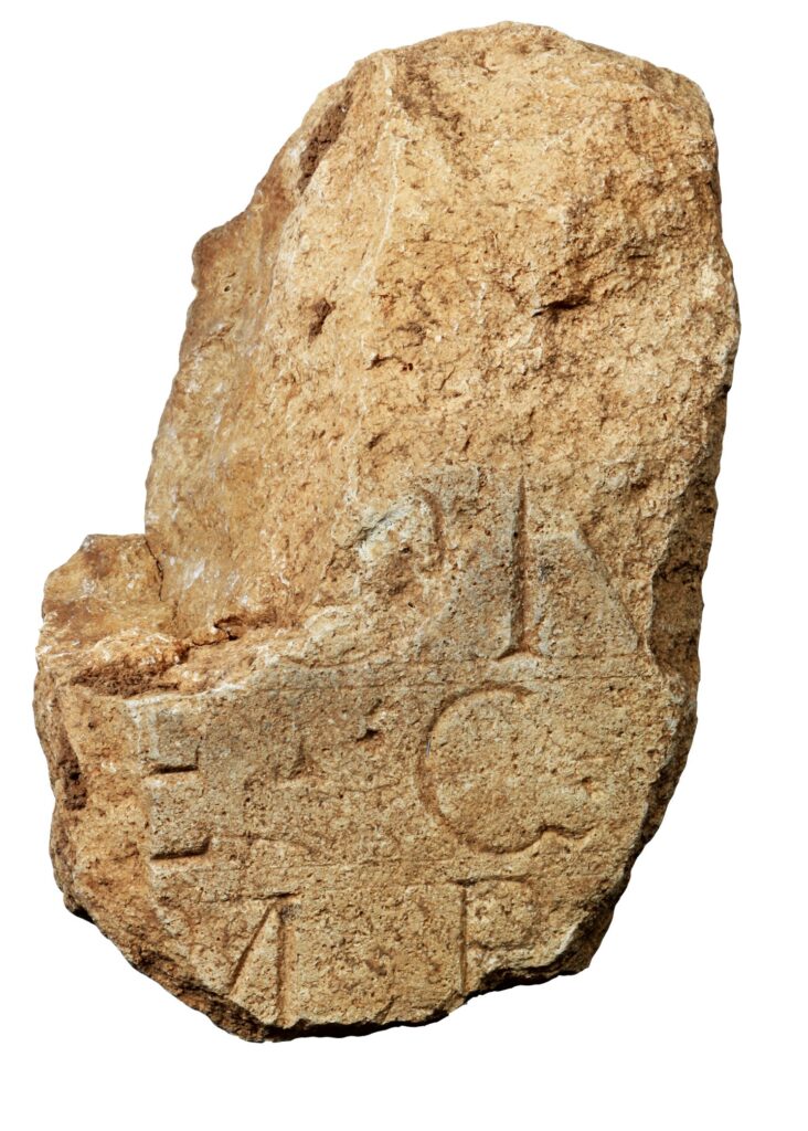 Fragment of a dedicatory stone with inscription. Credit: Museums of the City of Regensburg