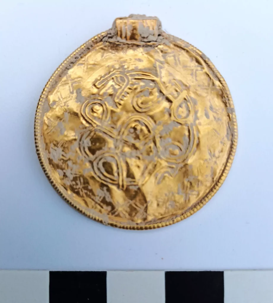 Gold Pendant. Credit: Andrew Richardson