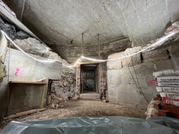Section view of the massive 4th-century Roman apse foundation uncovered during excavations at the MiQua site in Cologne. Credit: Stadt Köln/Römisch-Germanisches Museum, Michael Wiehen