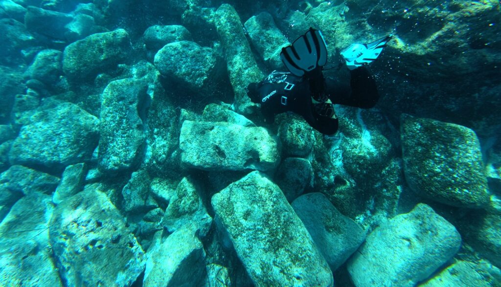 Divers examining the submerged remains of the ancient harbor infrastructure near Ptolemais. Credit: Polish Archaeological Mission to Ptolemais