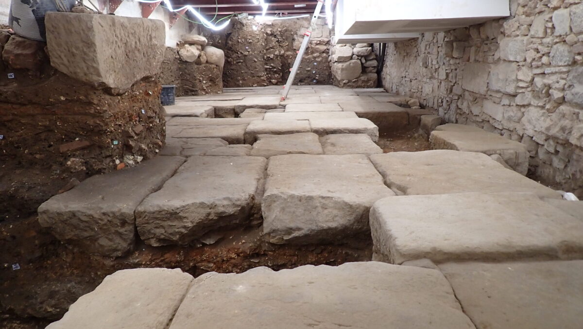 Monumental stone pavement from the Roman forum of Barcino discovered beneath the Gran Hotel Barcino in Barcelona. Credit: : Jordi Amorós (Ager arqueologia)