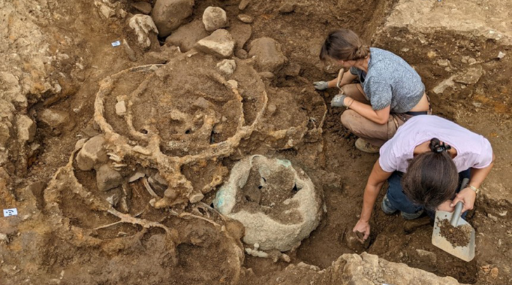 The deposit of iron tyres in Trench 1 shortly after being uncovered (photograph: Durham University). Credit: Adams S, 2026, Antiquity