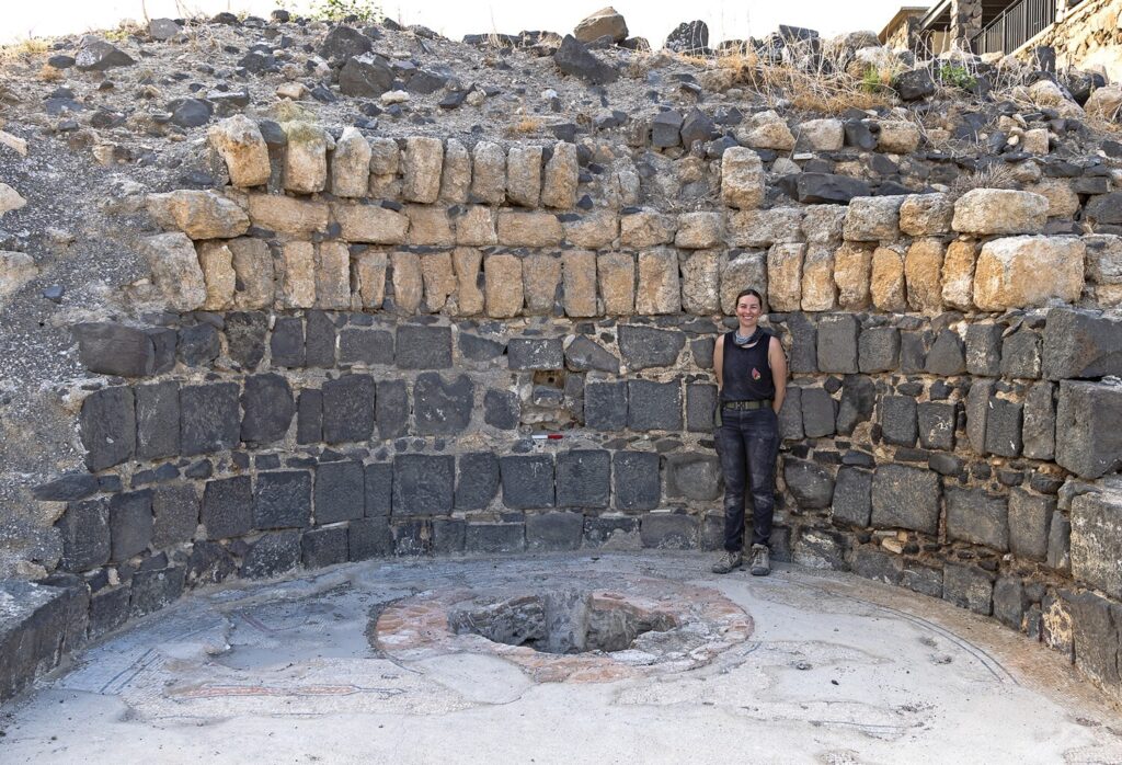 The middle apse of the northern photisterion and its re-exposed baptismal font, looking east. Note the original lead pipe in the middle of the apse, above the scale (20 cm), and the two phases of the mosaic floor (M. Eisenberg). Credit: Eisenberg, M.,  et al.,2026, Palestine Exploration Quarterly