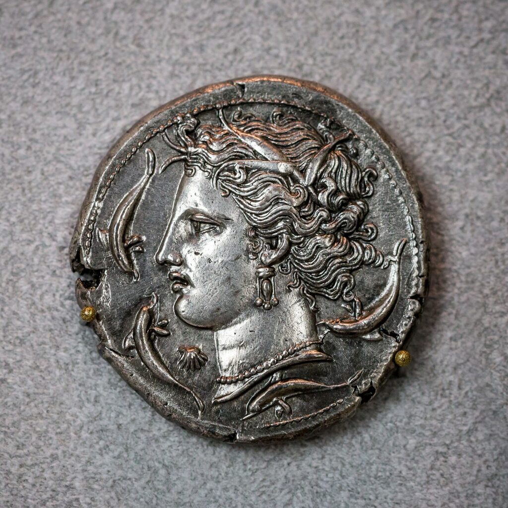 A Punic coin featuring Tanit, minted in Carthage between 330 and 300 BCE. Credit: Public Domain
