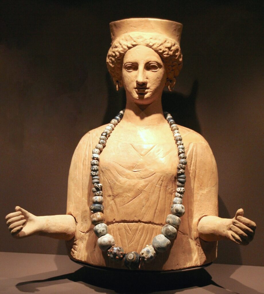 Adorned statue of the Punic goddess Tanit, 5th–3rd centuries BC, from the necropolis of Puig des Molins, Ibiza (Spain), now housed in the Archaeology Museum of Catalonia (Barcelona). Credit: Public Domain