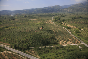 Aerial view of the Aghios Vasileios hilltop from the west. Photograph by V. Georgiadis, from Wiersma et al. Reference Wiersma, 2022, 124. © Corien Wiersma, Aghios Vasileios Survey Project (printed with permission). Credit: Beck, H., 2026