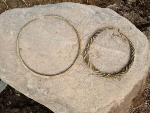 Archaeologists Discover Rare 2,500-Year-Old Bronze Age Neck Rings in Swedish Grave