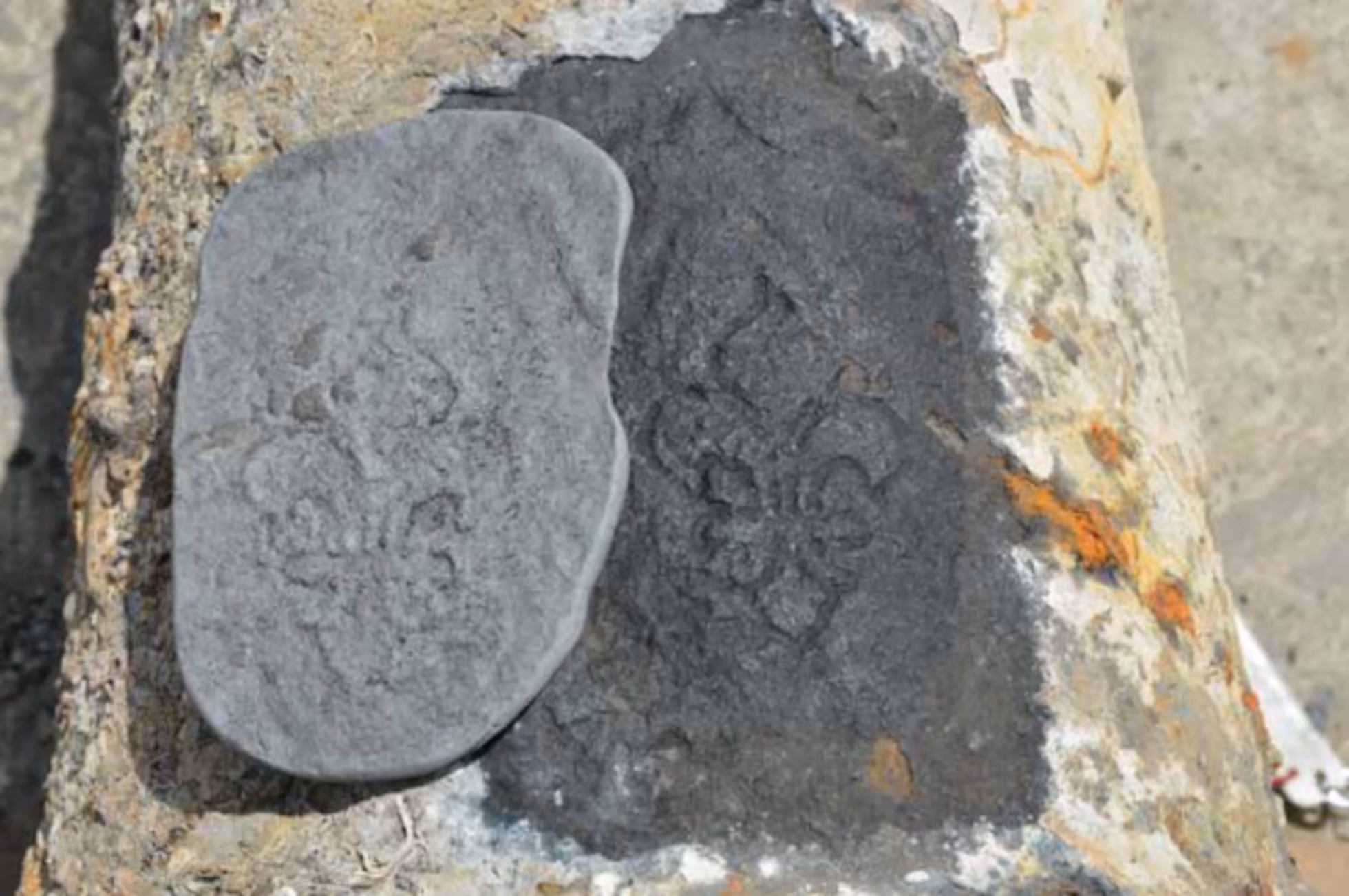 Silver ingot bearing a fleur-de-lis mark. Credit: The Andalusian Institute of Historical Heritage