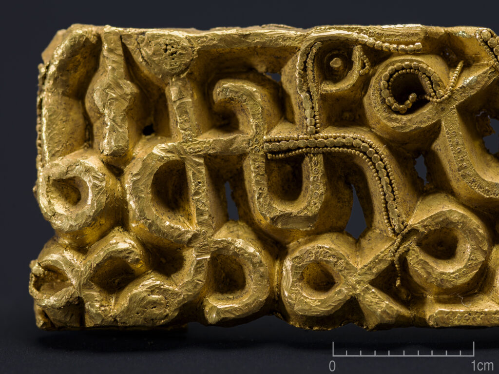 
The sword-scabbard fitting is six centimeters wide, a couple of centimeters high, and only a few millimeters thick. It once belonged to a prestige sword used only by the most powerful individuals of the period. Credit: Annette Græsli Øvrelid, Arkeologisk museum, Universitetet i Stavanger