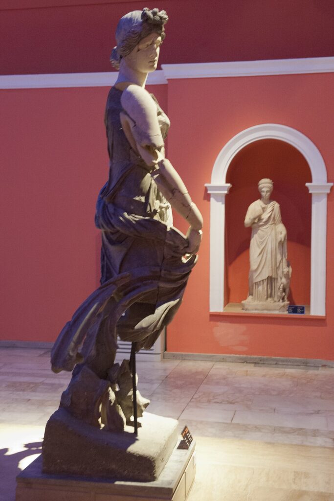 Reconstructed from 103 fragments, the statue’s strong sense of movement has led scholars to interpret the figure as a dancer.  Credit: Dosseman - Public Domain