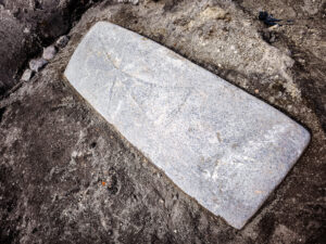 13th-Century Tombstone Found Beneath Gdańsk Ice Cream Parlor Deepens Mystery of Poland’s Oldest Wooden Church