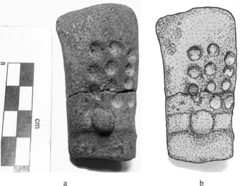2,700-year-old La Blanca ceramic figurine from Guatemala with eleven impressed dots that may represent early Mesoamerican numeration. Credit: Julia Guernsey