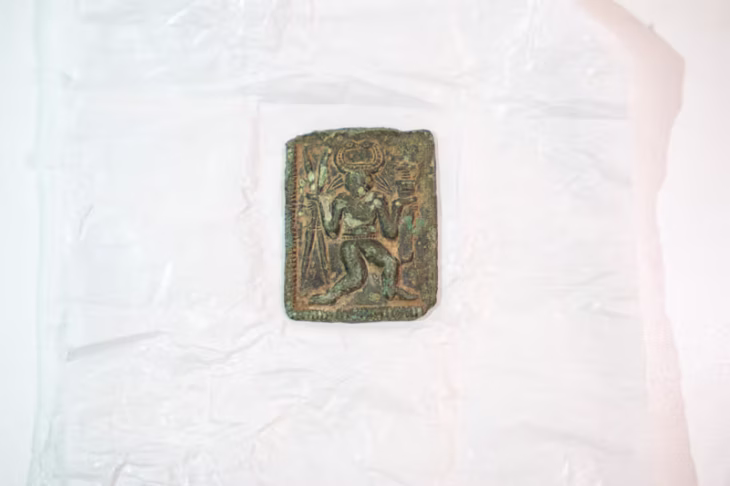 The small copper-alloy object, found by metal detectorist Stephen Newbury, is the only confirmed example of its kind found in Britain. Credit: Kent County Council