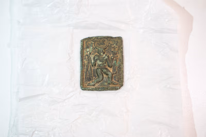 The small copper-alloy object, found by metal detectorist Stephen Newbury, is the only confirmed example of its kind found in Britain. Credit: Kent County Council