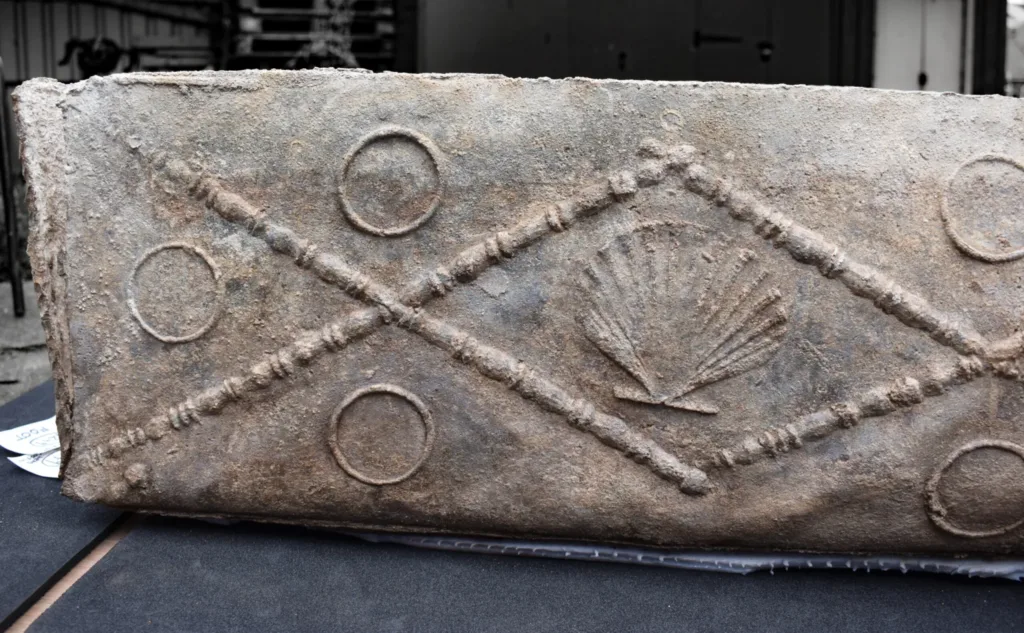 The inner coffin was decorated with a bead-and-double-reel linear motif arranged in a diamond pattern. Scallop shells and circular designs were also included in the decoration. Credit: Colchester Archaeological Trust