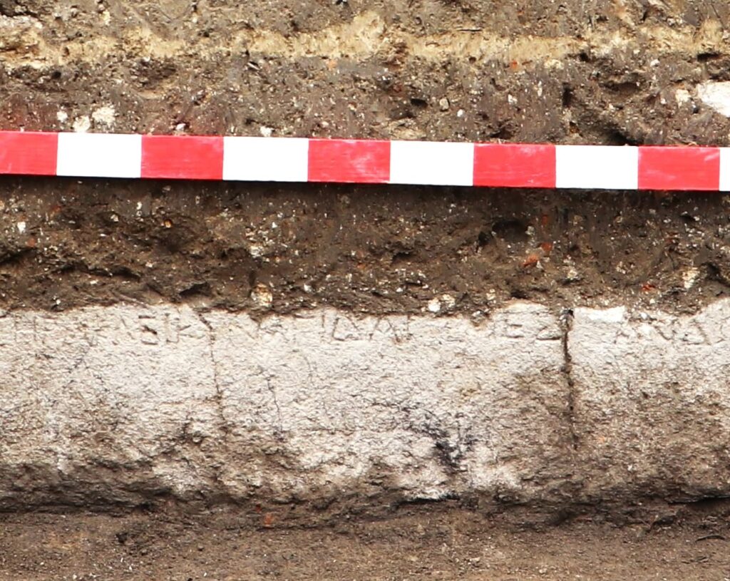 The first inscription naming Heracles Kynagidas at Heraclea Sintica was discovered on an altar near the newly found ritual stone cup. The text includes a dedication by Antigonus to Heracles Kynagidas, “Heracles the Hunter.” Credit: Archaeologia Bulgarica