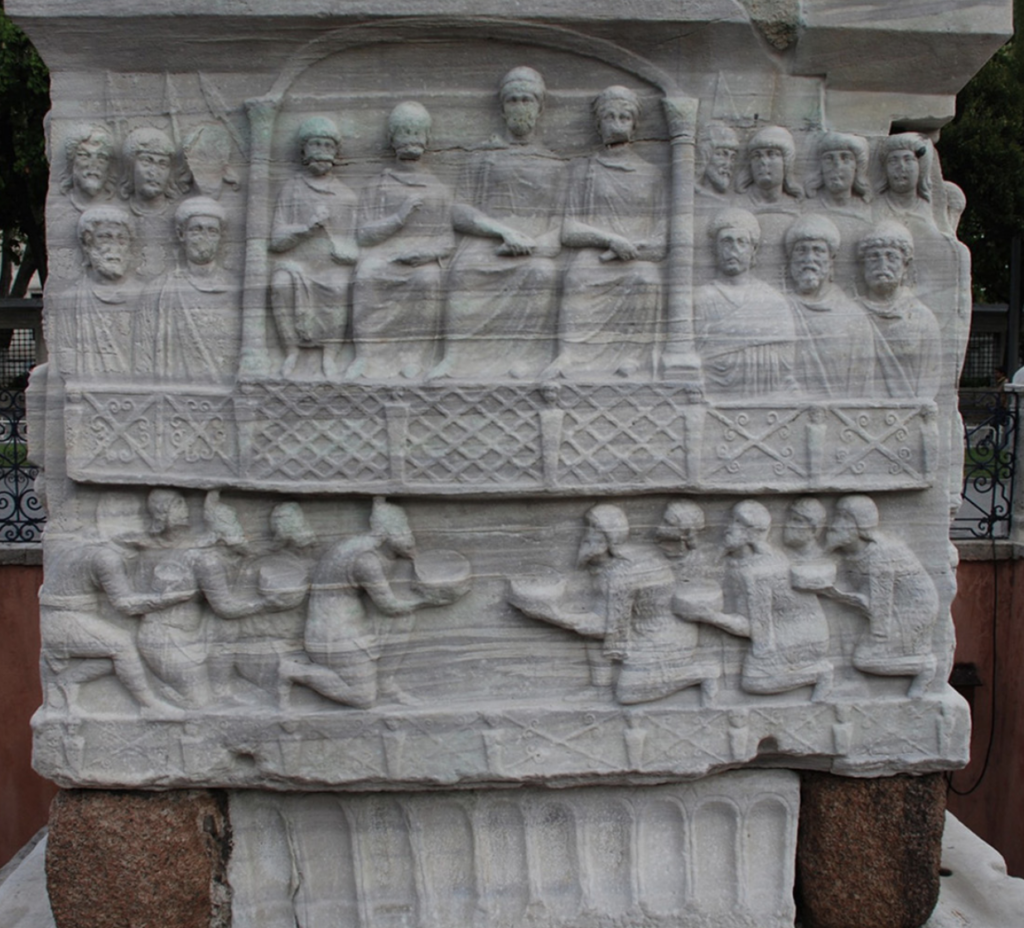 Base of the Obelisk of Theodosius I in the Hippodrome of Constantinople. The lower register shows bearded figures presenting gifts to Theodosius, while the upper right depicts long-haired guards of the scholae palatinae. Credit: J. Arce.