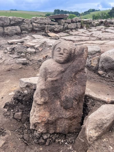 Carved stone depicting a Genius in situ. Credit: The Vindolanda Trust