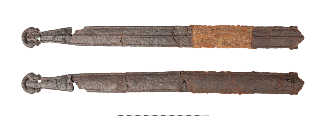 Decorated iron sword scabbard, shown from the front and back. Credit: Emmanuelle Collado, Inrap
