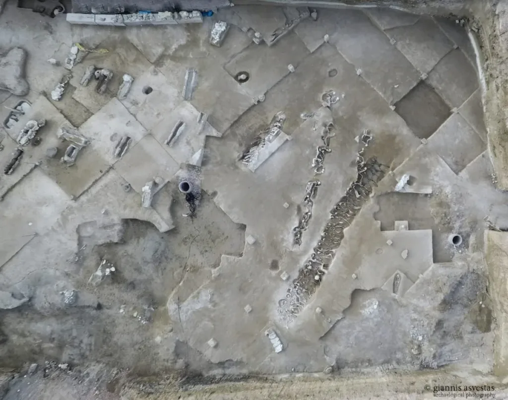 Aerial view of the Esplanada mass grave at the Phaleron Burial Ground, where 79 shackled men were found buried in three rows. Credit: Giannis Asvestas, Hellenic Ministry of Culture