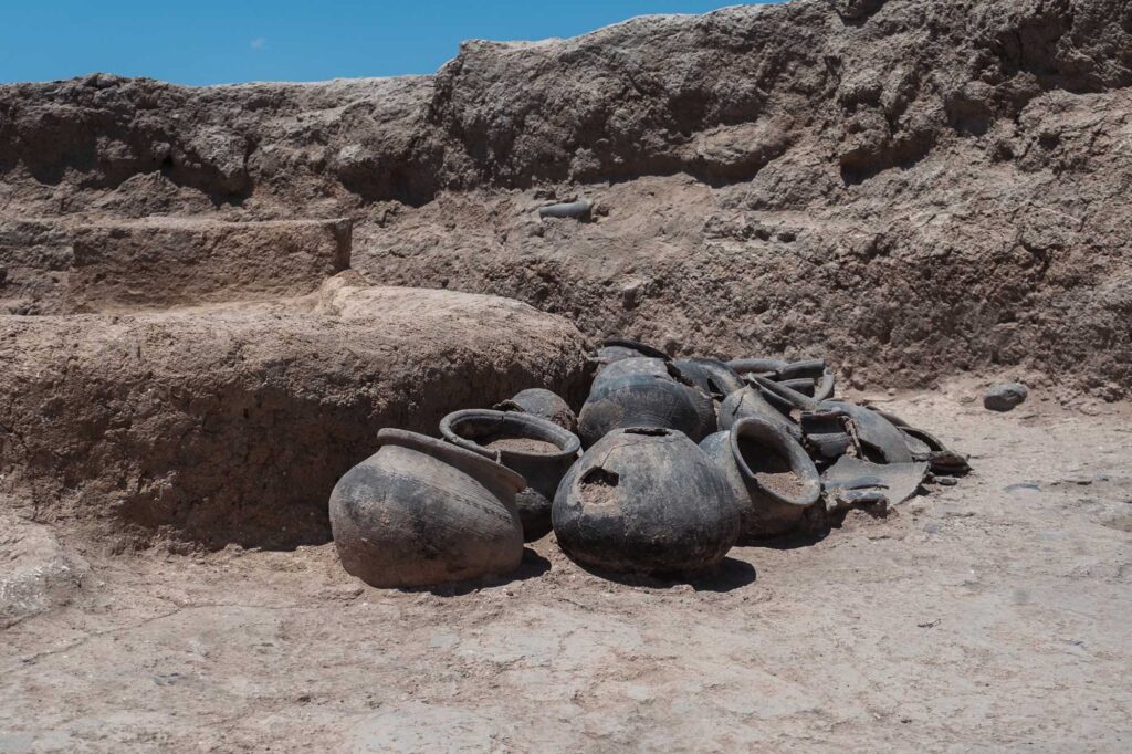 
Cooking vessels found in situ within the circular structure at Tava Tepe. Credit: University of Catania