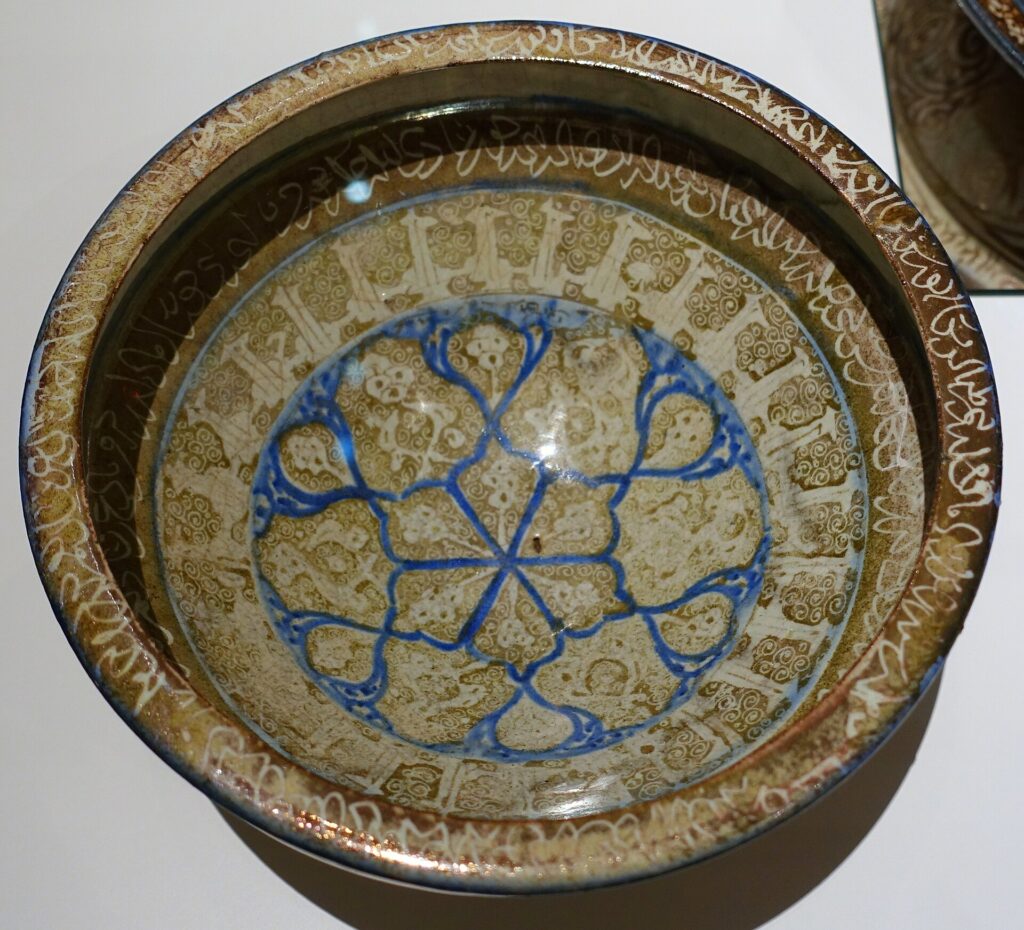 A 13th-century fritware dish from Persia, illustrating the kind of finely glazed, lustrous ceramics prized throughout the medieval Islamic world. Credit: Public Domain