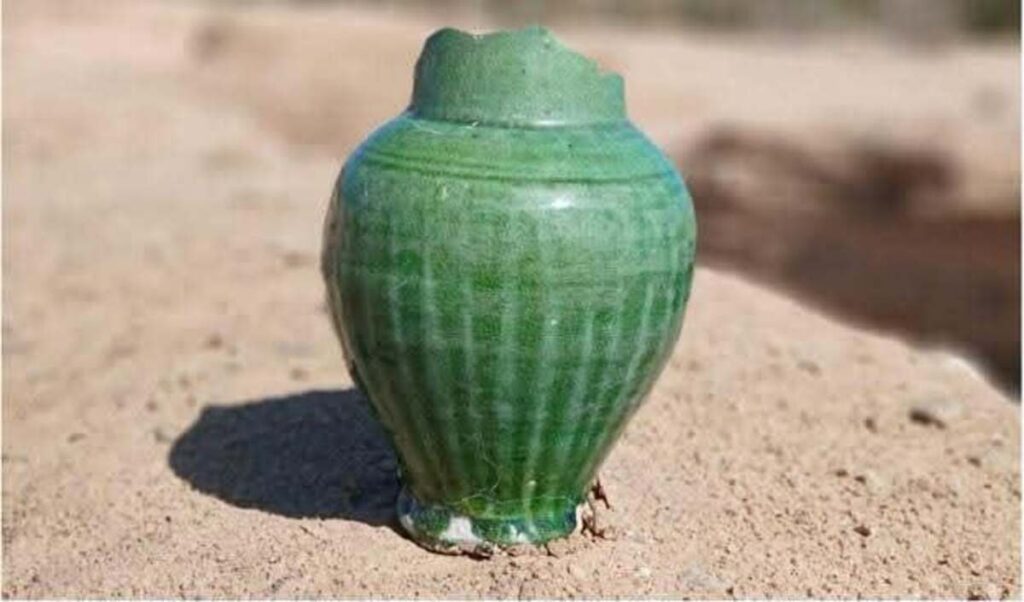Olive-green glazed vessel unearthed at Asila, dated to the Mamluk period. Credit: Egyptian Ministry of Tourism and Antiquities