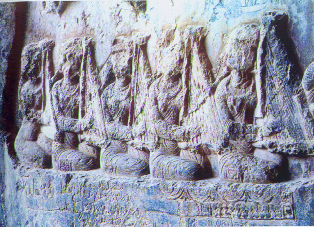 A Taq-e Bostan carving depicts women playing changs (Persian harps) while the king is hunting