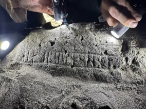 Rare Runestone Found Beneath a Medieval Chapel in the Faroe Islands