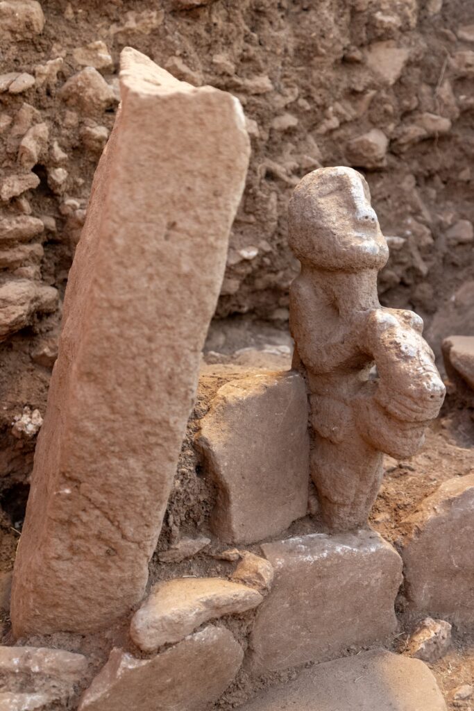 The newly discovered 11,000-year-old composite statue at Karahantepe depicts a human figure seated on the back of a leopard. Credit: Ministry of Culture and Tourism / Mehmet Nuri Ersoy
