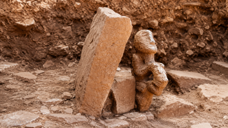 The newly discovered 11,000-year-old composite statue at Karahantepe depicts a human figure seated on the back of a leopard. Credit: Ministry of Culture and Tourism / Mehmet Nuri Ersoy