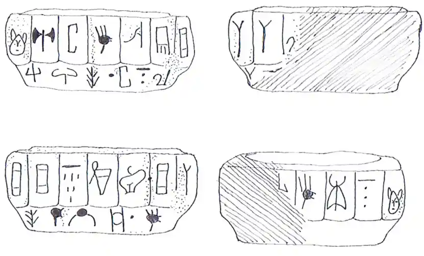 The Linear A inscription runs continuously in two horizontal lines around all four sides of the miniature serpentinite libation table, adapting the ritual text to the object’s exceptionally limited writing surface. Credit: M. Schümann, 2026.