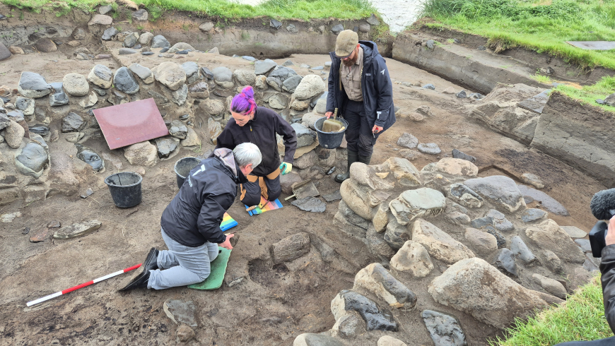 The runestone was found embedded in the floor of a building uncovered during this summer's excavation at Á Sondum, Sandur. 