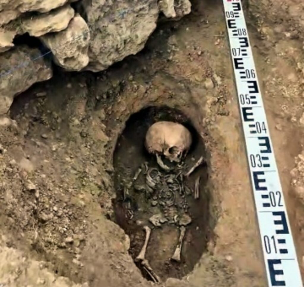 The tiny skeleton was found tucked beneath an altar table, right at the base of the north wall of the Temple of Zeus Genarchos and Soter — a name that roughly translates to "Zeus the Progenitor and Savior."