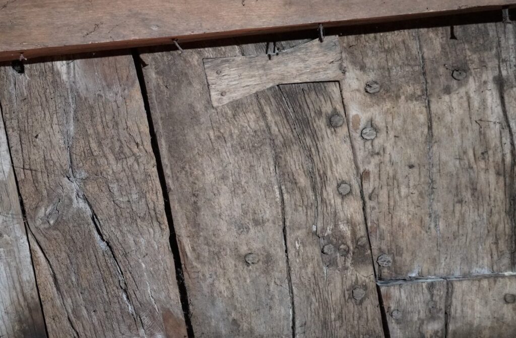 The cellar ceiling is made up of at least 19 heavy wooden planks, later identified as parts of a medieval ship hull. Credit: Landesamt für Denkmalpflege