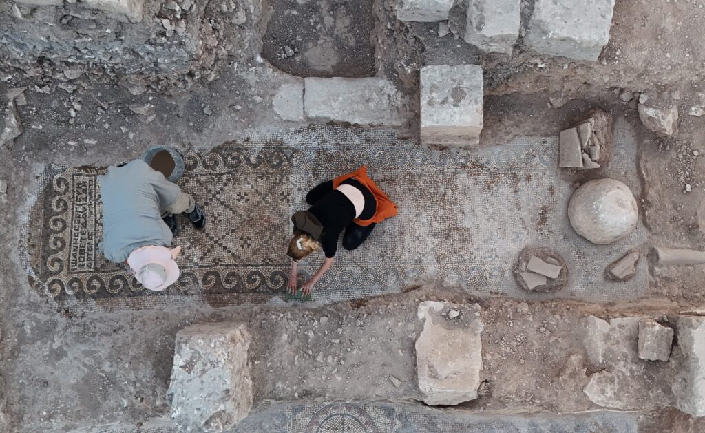 A Greek inscription visible along the edge of the mosaic, part of the epigraphic panels uncovered at the martyr's church site in Şanlıurfa Castle. Credit: Arkeoloji Haber