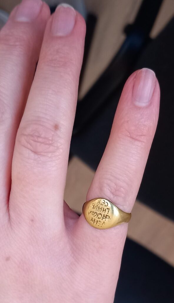 The 14th-century Byzantine gold seal ring of Maria Skulena shown on the hand of a modern woman, illustrating its scale and how it would have been worn. Image courtesy of Prof. Nikolay Ovcharov.