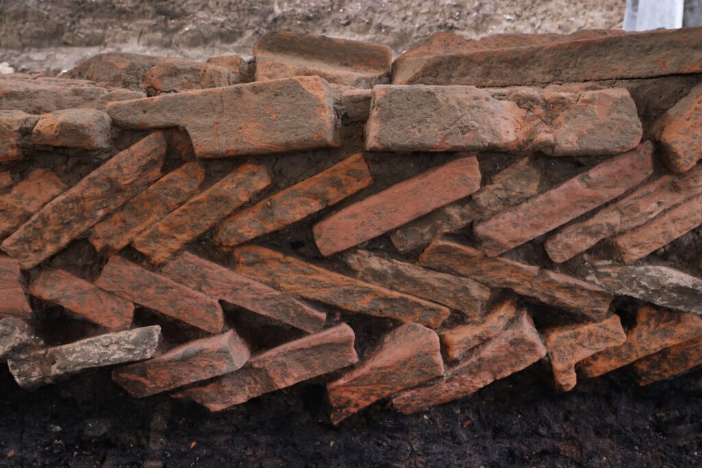 Detail of a wall structure built with reused Roman bricks. 