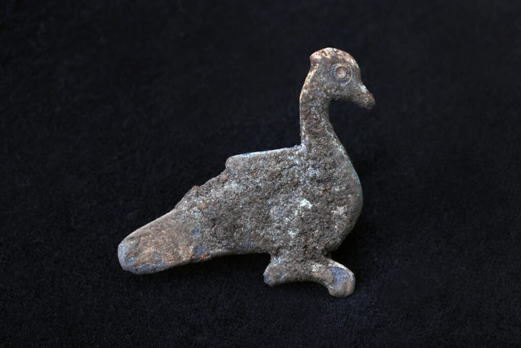 Bronze zoomorphic brooch, probably depicting a peacock, dating to the 2nd–3rd centuries AD. 
