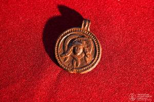 Rare 11th-Century Amulet Found with a Christian Saint on One Side and ‘Medusa’ on the Other