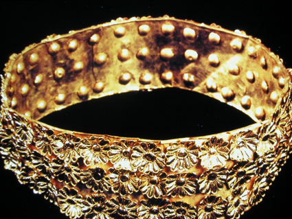 Gold crown from Tomb II at Nimrud decorated with floral motifs.