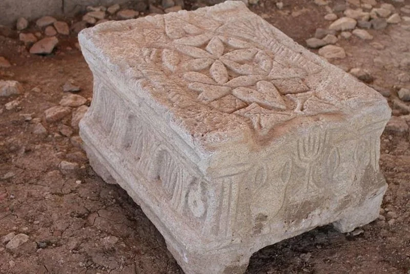 The Magdala Stone may preserve one of the earliest synagogue depictions of the menorah, carved while the Second Temple in Jerusalem was still standing. Its precise purpose remains uncertain.
