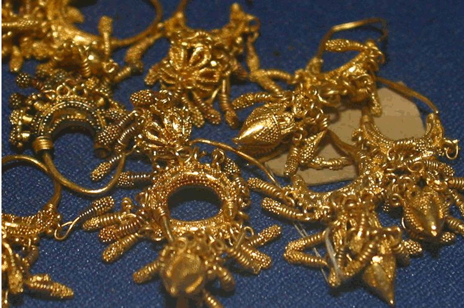 Intricately worked gold jewelry excavated from the royal tombs at Nimrud in 1989.