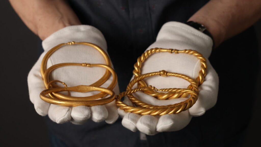The six gold arm rings from the Rold Hoard, discovered in spring 2026. Credit: Nordjyske Museer.