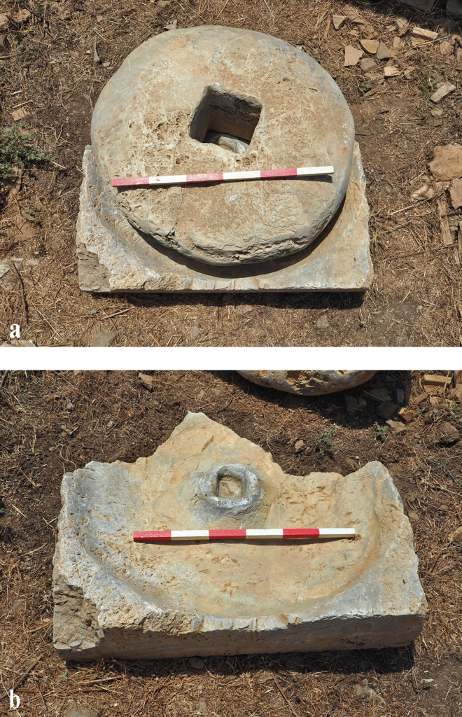 Rotary trapetum mill stone (a) and base (b) used for crushing olives, discovered in the eastern hall of the Small Bath at Antiochia ad Cragum.